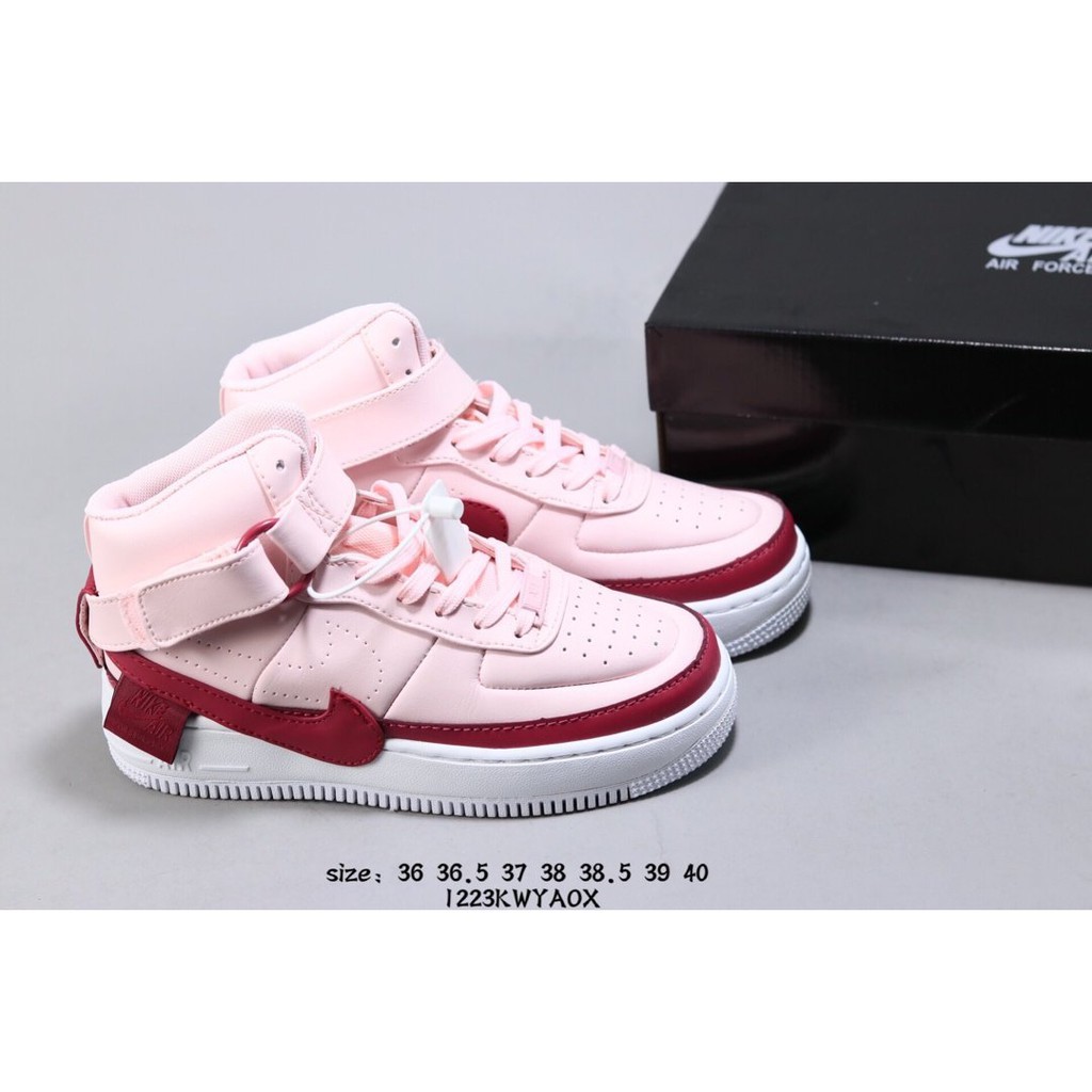 pink and white nike high tops