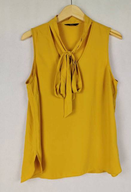 Max yellow sleeveless blouse