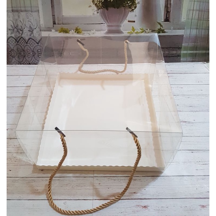 

BoxMikaHandleTali/KotakKueMika24x24x15(Min5pcs)Rp18.000