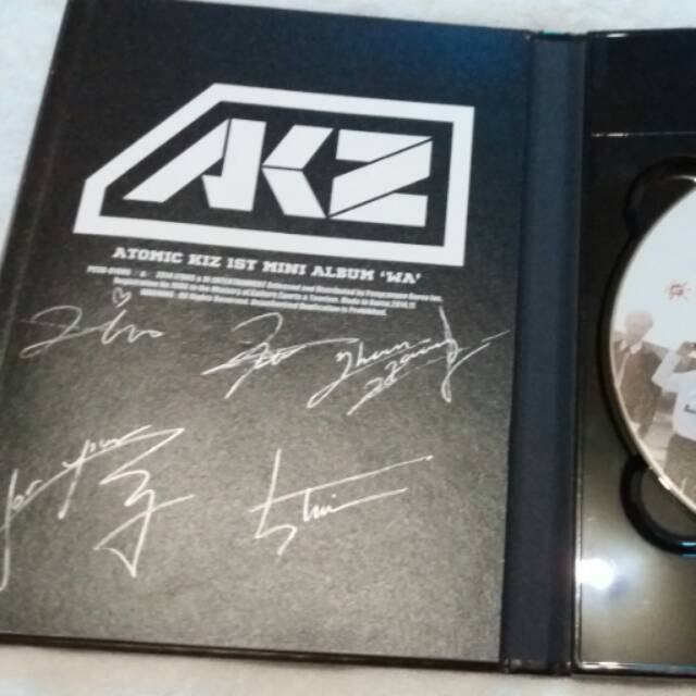 AKZ SIGNED ALBUM