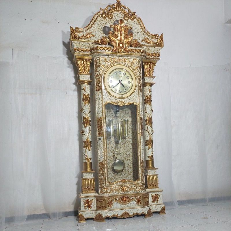 Lemari Hias Ruang Tamu jam kayu jati