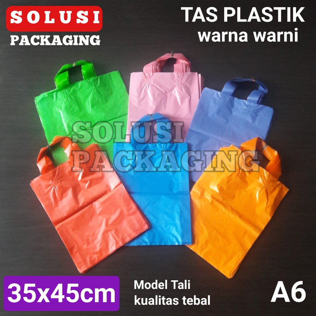 

TAS PLASTIK WARNA 35x45 CM TALI ISI 100/TAS MALL TAS PRODUK KANTONG PLASTIK PACKING