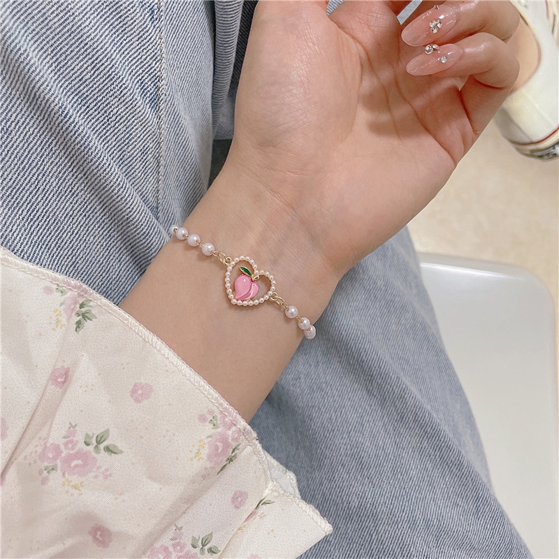 Gelang Rantai Mutiara Bentuk Hati Model Hollow Warna Pink Peach Untuk Wanita