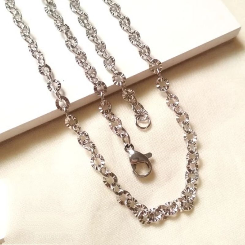 KALUNG TITANIUM NURI MOTIF SILVER BERSINAR 0.8 FASHION PRIA WANITA TERBARU