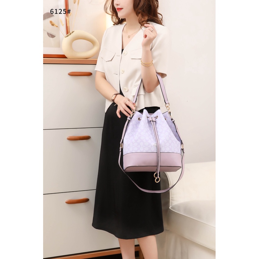 Coa Signature And Leather Bucket Bag 6125