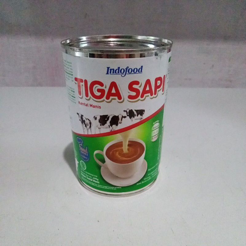 

Tiga Sapi susu kental manis 490 gr