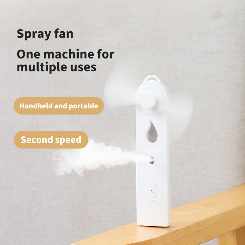 【COD/Pengiriman Cepat】Kipas Genggam Multifungsi Angin 2 in 1 dengan Humidifier Pocket Fan  Nano Spray Kipas Humidifier Pocket Fan USB Rechargeable Kipas Angin Mini Perawatan Wajah  Moisturizing And Hydrating Air Humidifier Aroma Difusier Essential Oil