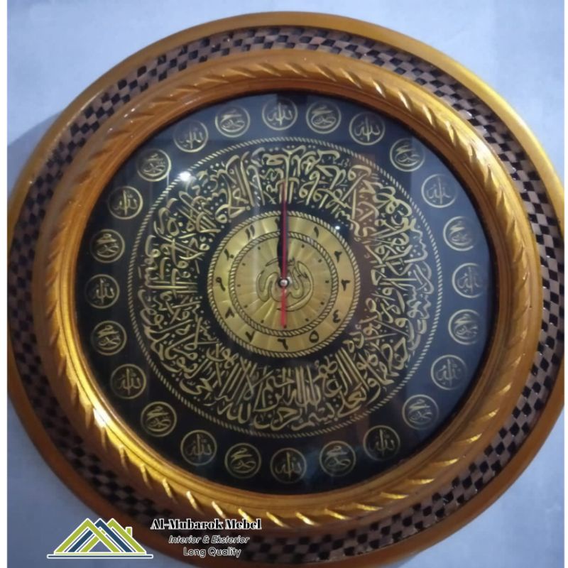 Jam dinding kaligrafi ukiran khas Jepara