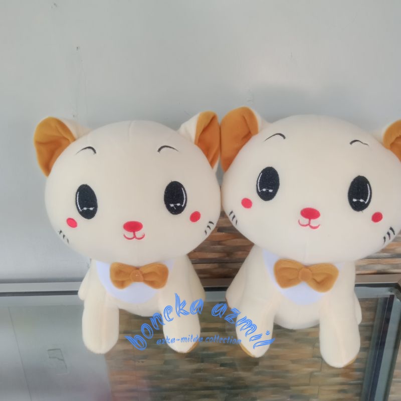 Boneka kucing duduk manis size l