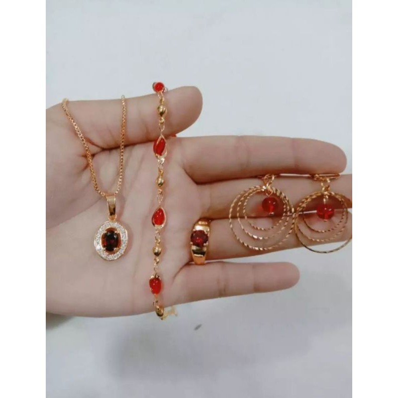 set perhiasan permata merah