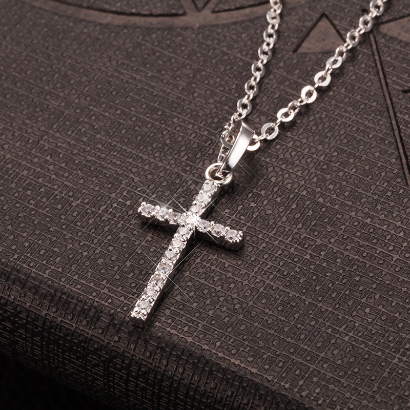 Kalung Liontin Salib Yesus Bahan Stainless Steel Aksen Kristal Untuk Wanita