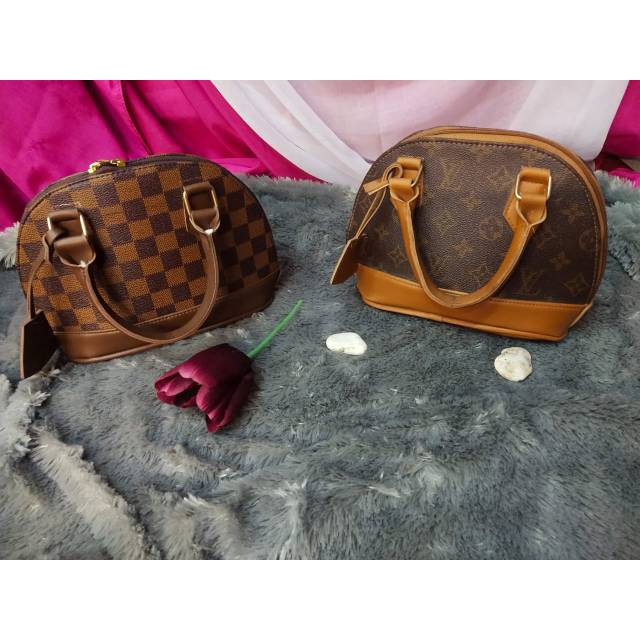 Tas LV Oval Mini