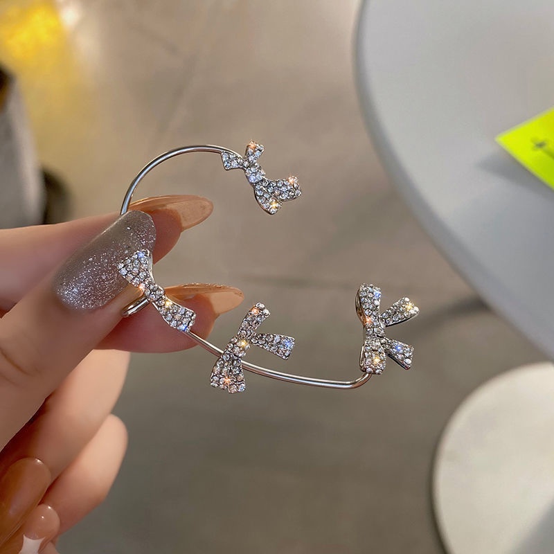 Anting Klip Desain Pita Aksen Kristal Gaya Korea Untuk Wanita