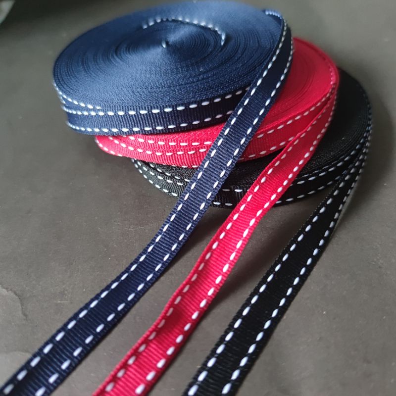 

pita polyester motif/ukuran 1cm