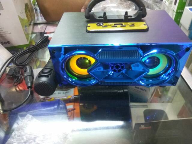 SPEAKER BLUETOOTH FREE MIC FLECO F4 BT RADIO FM/SALON AKTIF PORTABLE SUPER BASS USB  MP3 MOTIF KAYU