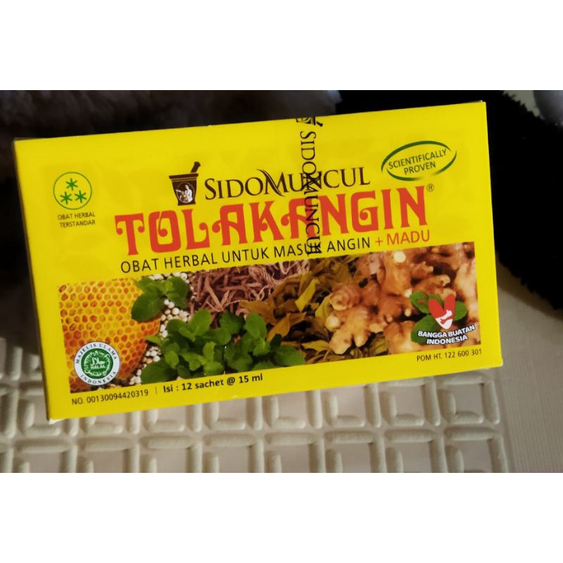 Tolak angin cair 12 sachet