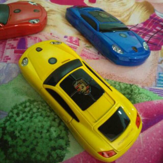 handphone unik newmind Y918 bentuk mobil porsche/hp kolektor langka