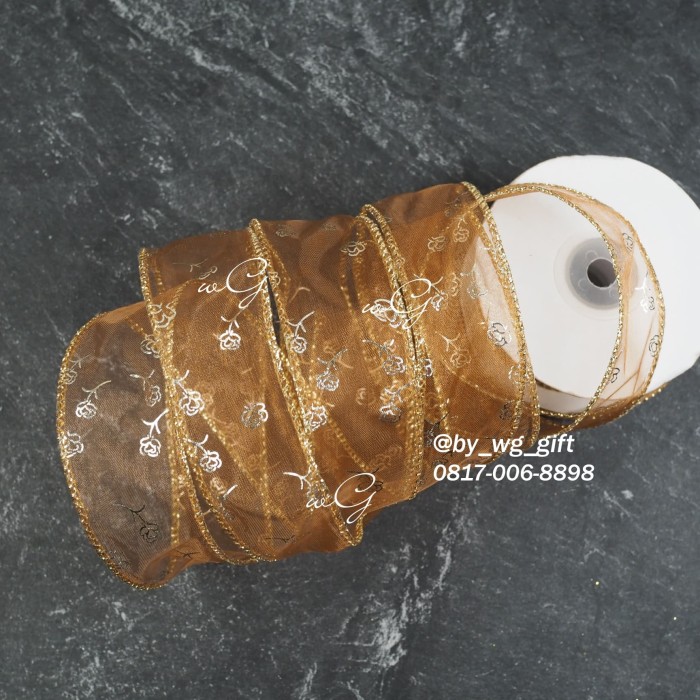 

Pita Coklat List Transparan ; L 3.8 cm; Panjang 10 yard - Warna Coklat