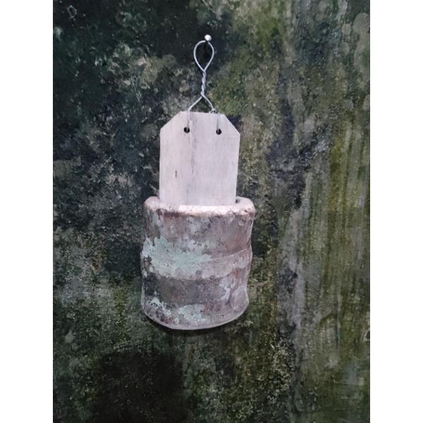 pot dinding kayu pinang