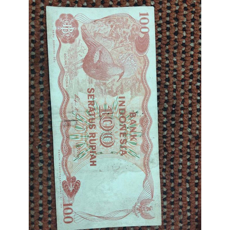 uang 100 rupiah burung dara 1984