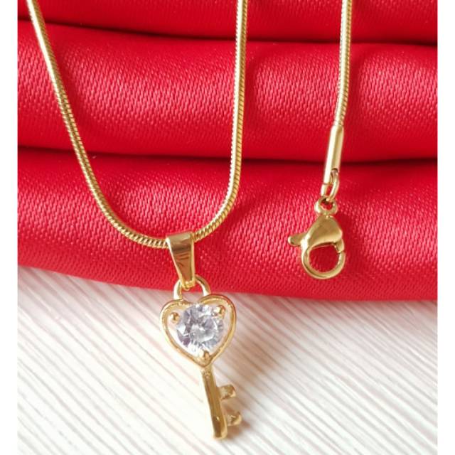 Kalung fashion Key / kalung titanium / titanium gold antikarat GN14