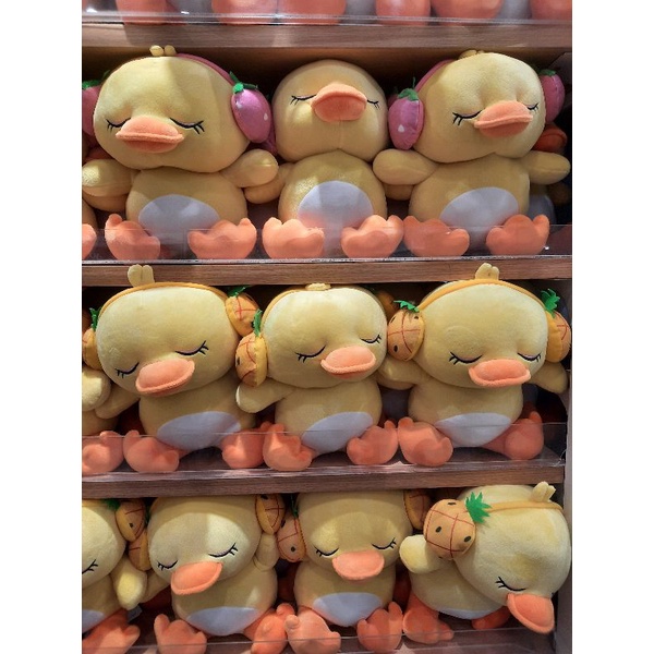 miniso boneka bebek berheadphone lucu