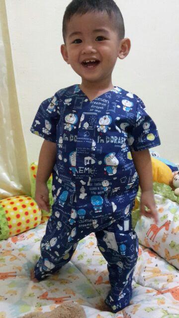 Piyama Doraemon Pintu Ajaib Biru Muda