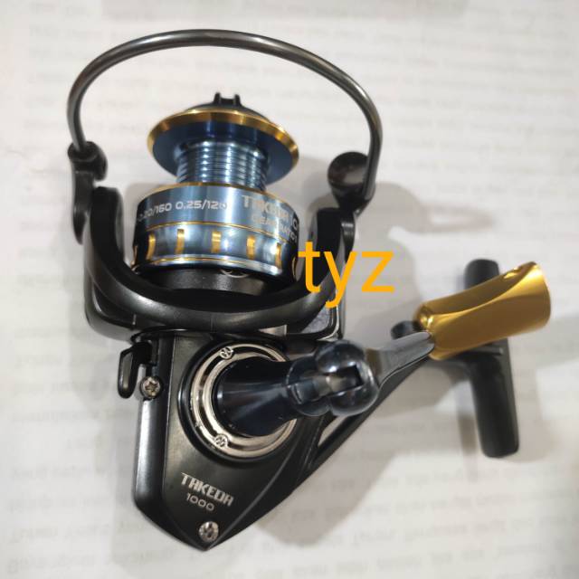 Reel fugu takeda 1000 powerhandle (12+1bb)