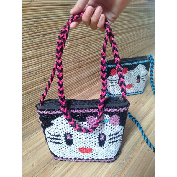 TAS MANIK MOTIF DAYAK