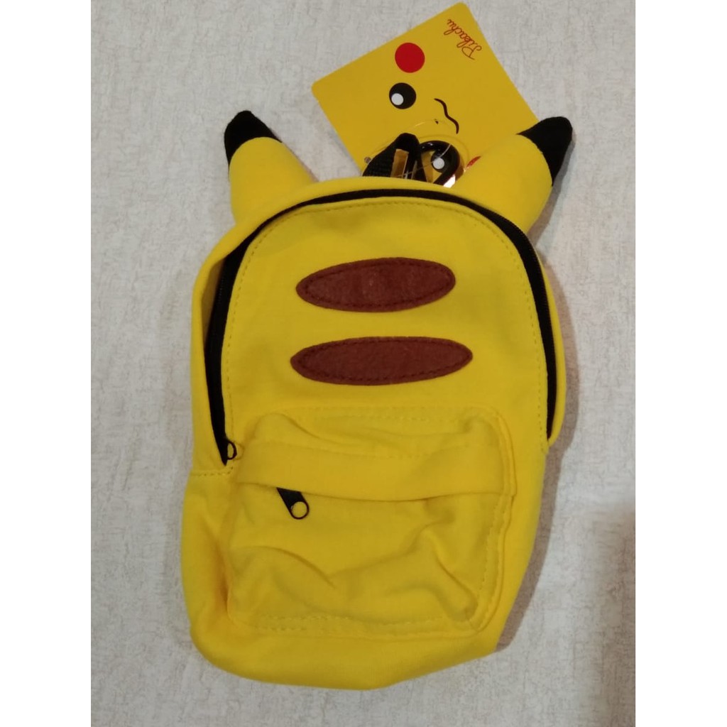 

TAS POKEMON PIKACHU ORIGINAL UKURAN 15x4.5x18cm (PxLxT) WARNA KUNING