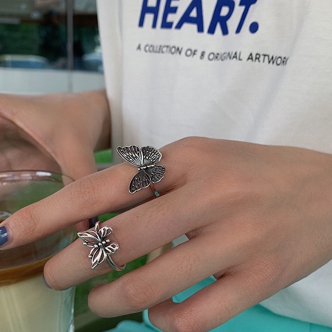 Cincin Butterfly Adjustable Bahan Stainless Steel Warna Silver Gaya Vintage Untuk Wanita