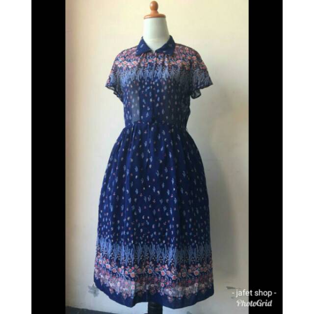 blue dress with orange flowers