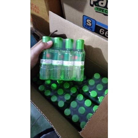 1 lusin.minyak kayu putih caplang kemasan 120ml