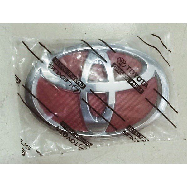 Logo / Emblem Grille Depan New Avanza Original Toyota Part