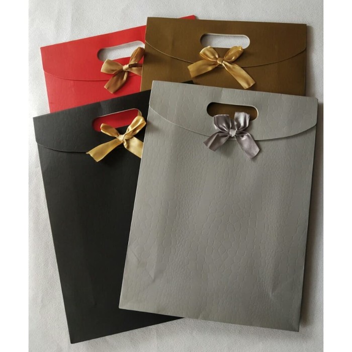 

BAYAR DITEMPAT Paperbag Tutup Pita Motif Crocodile Skin (XL)