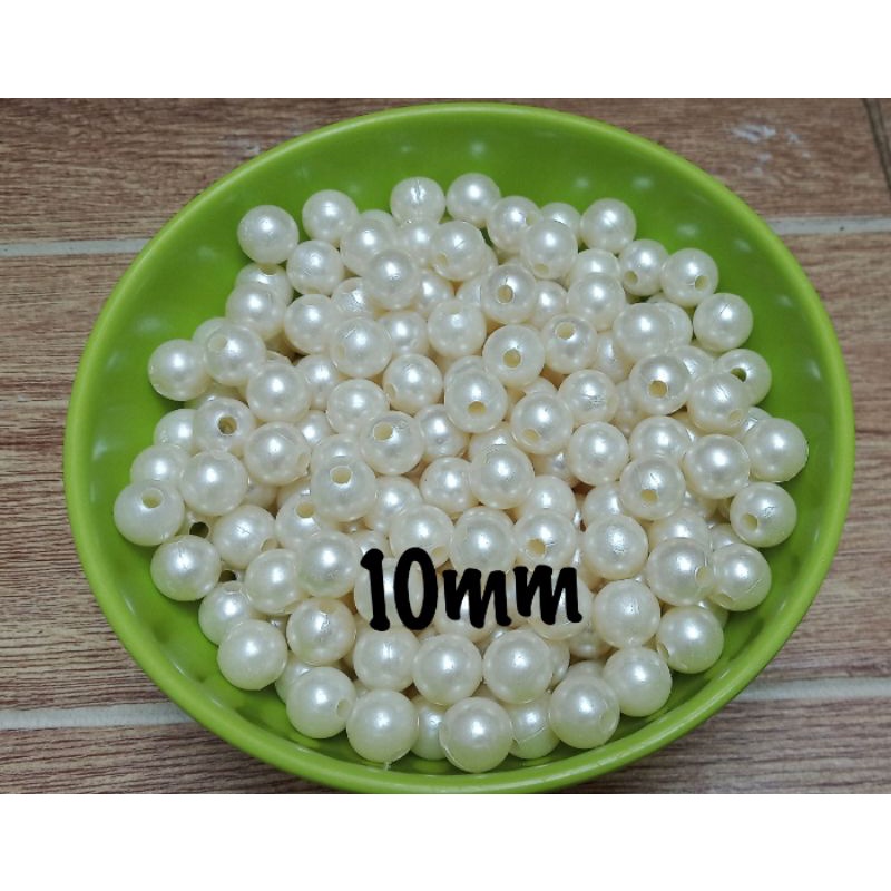 45 gr Mutiara sintetis 2 lobang size 10mm dan 14mm