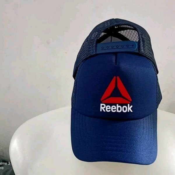 topi trucker jaring reebok