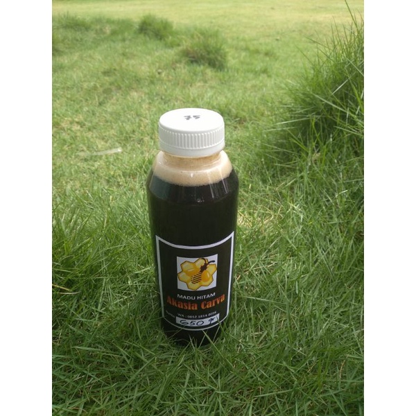 

Madu Lebah Murni Hitam 400 gram