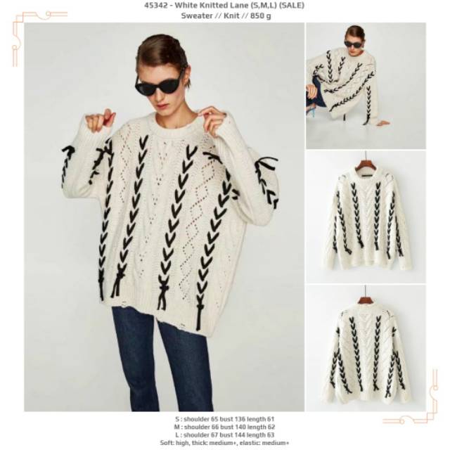 Sweater rajut jumbo putih tali pita bolong-bolong