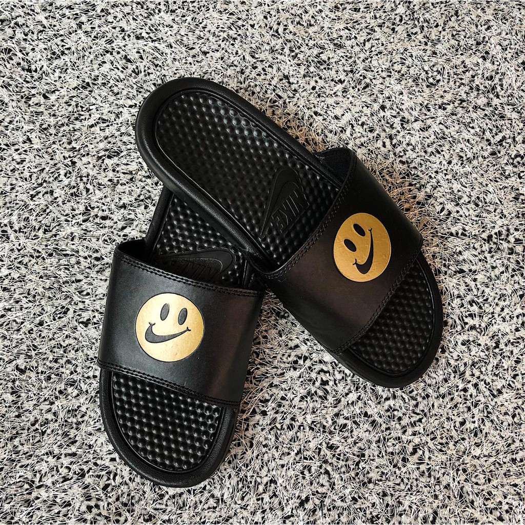 nike benassi slides gold