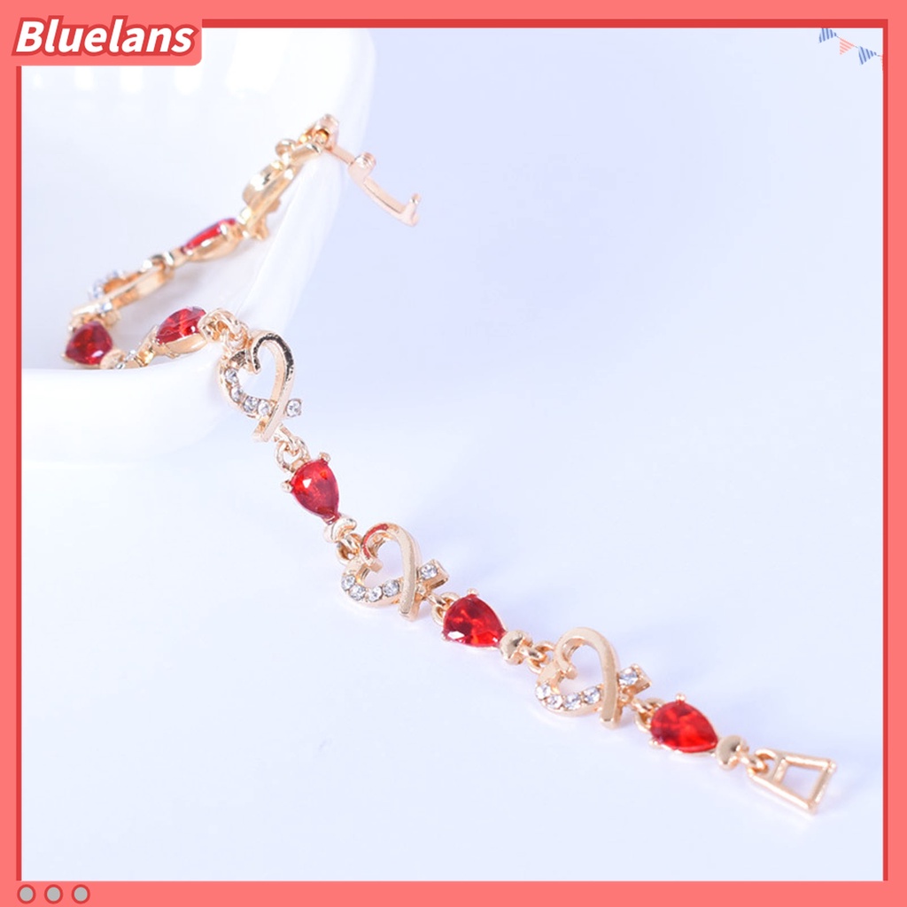 Gelang Rantai Desain Hati Hollow Aksen Berlian Imitasi Warna Merah Bahan Alloy Untuk Wanita