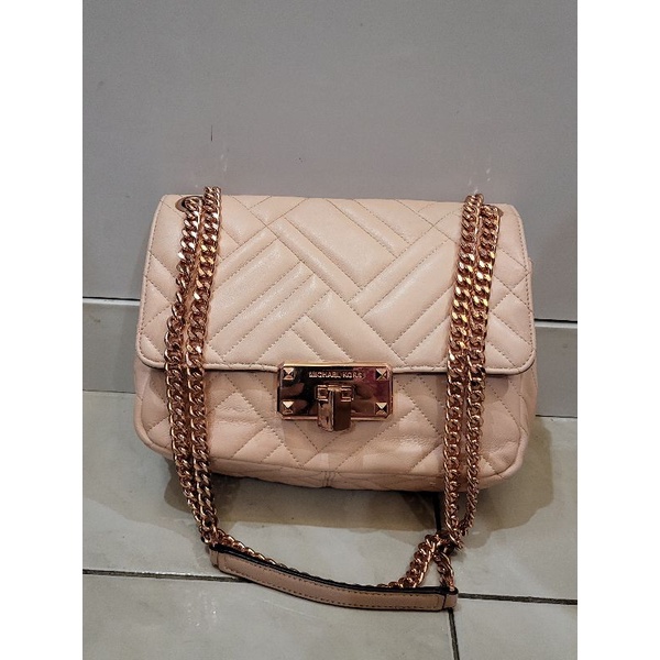 mk sling and shoulder baby pink preloved