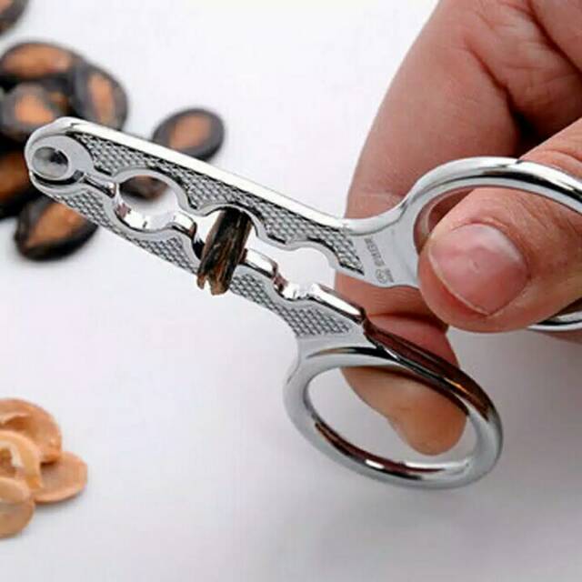 Gunting pembuka kuaci