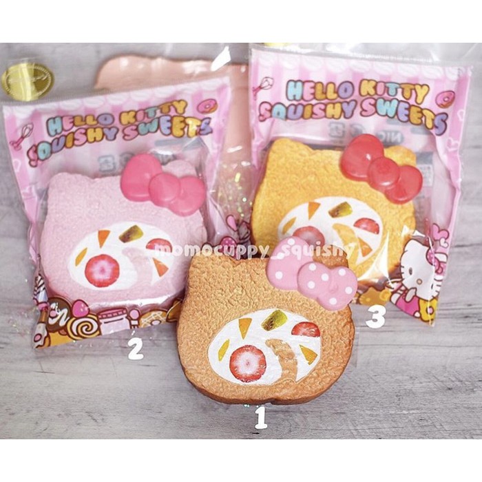 Squishy licensed hello kitty cake roll by Sanrio (ORIGINAL JEPANG)