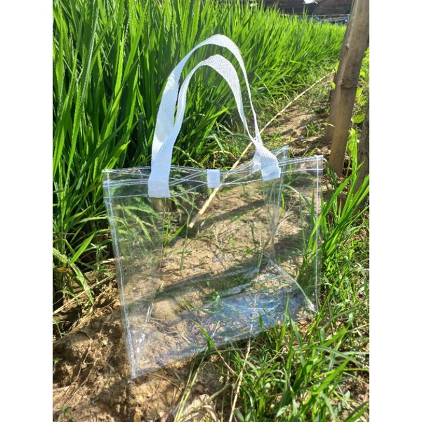 

Tas Parcel Imlek Transparan Pegangan Bisban 30x16x25