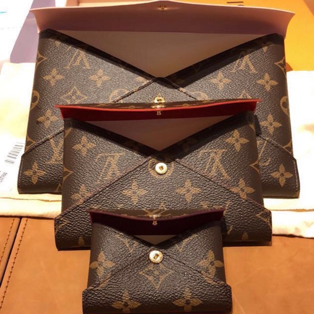 LV KIRIGAMI CLUTCH