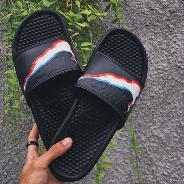 nike benassi slides gold swoosh