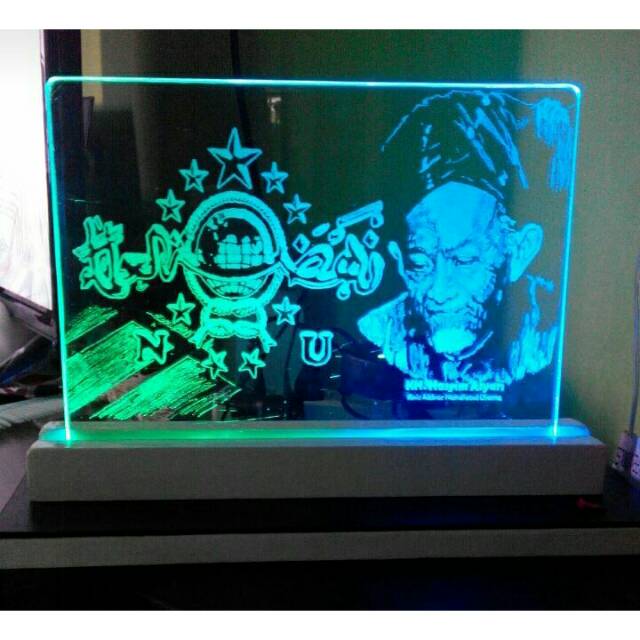 Lukisan ukir kaca Nu