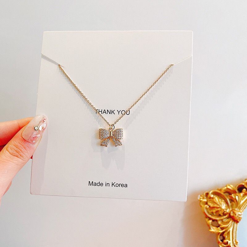 Kalung Titanium Ribbon Mata Tanam Wanita Korean