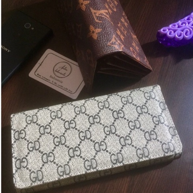 Dompet wanita model kipas klasik bahan kulit sinteys lokal banyak motif dan corak muat HP #dompet #dompetwanita #dompetcewek #dompetperempuan #dompetema #dompetcoin